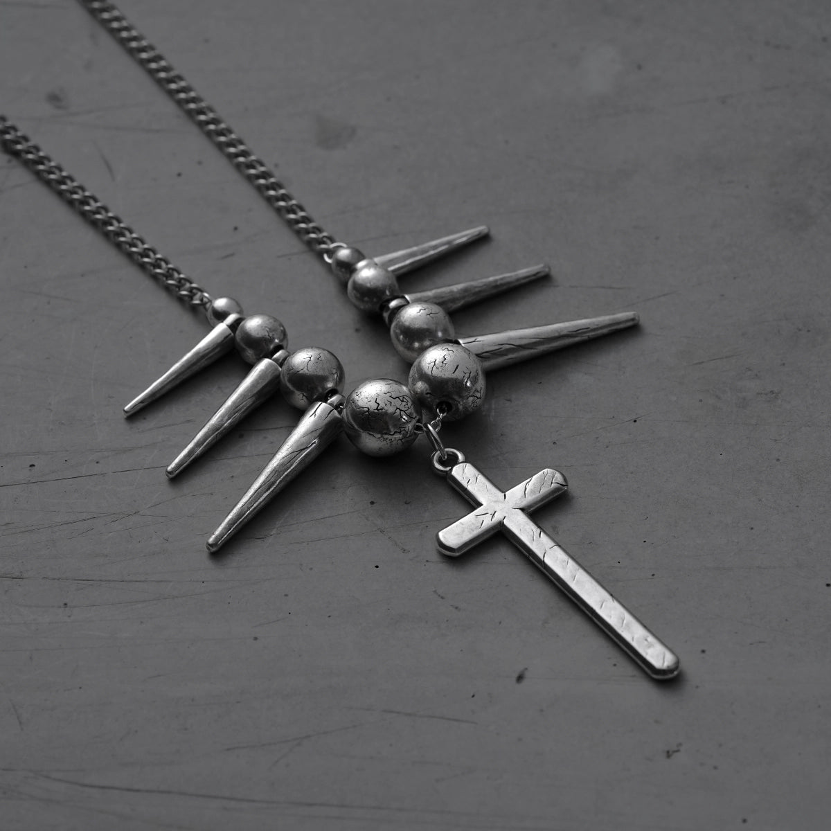 REBEL SPIKED CROSS NECKLACE