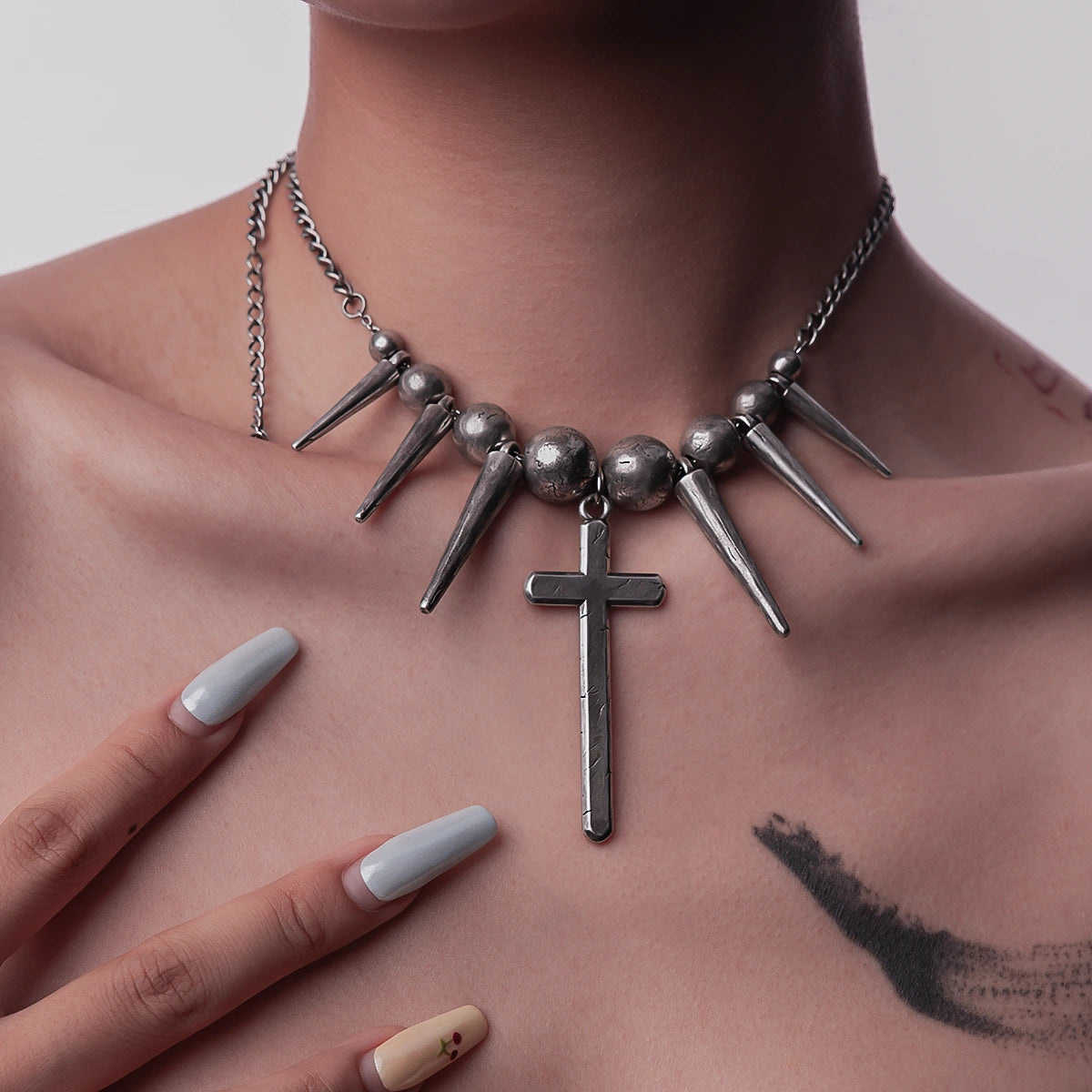 REBEL SPIKED CROSS NECKLACE