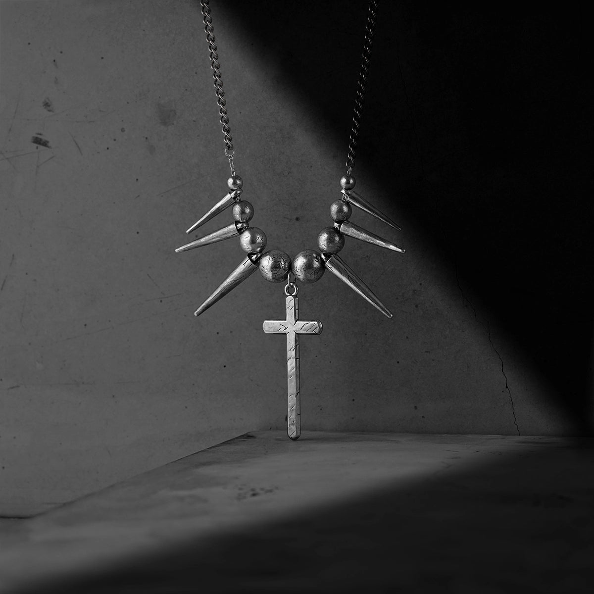REBEL SPIKED CROSS NECKLACE