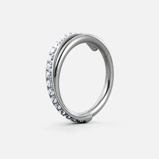 CLICKER EN TITANE EN CRISTAL ENTRELACÉ