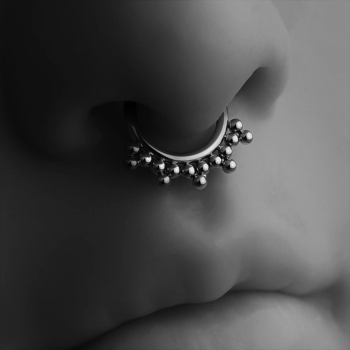 SYMMETRIC SPHERE TITANIUM SEPTUM CLICKER