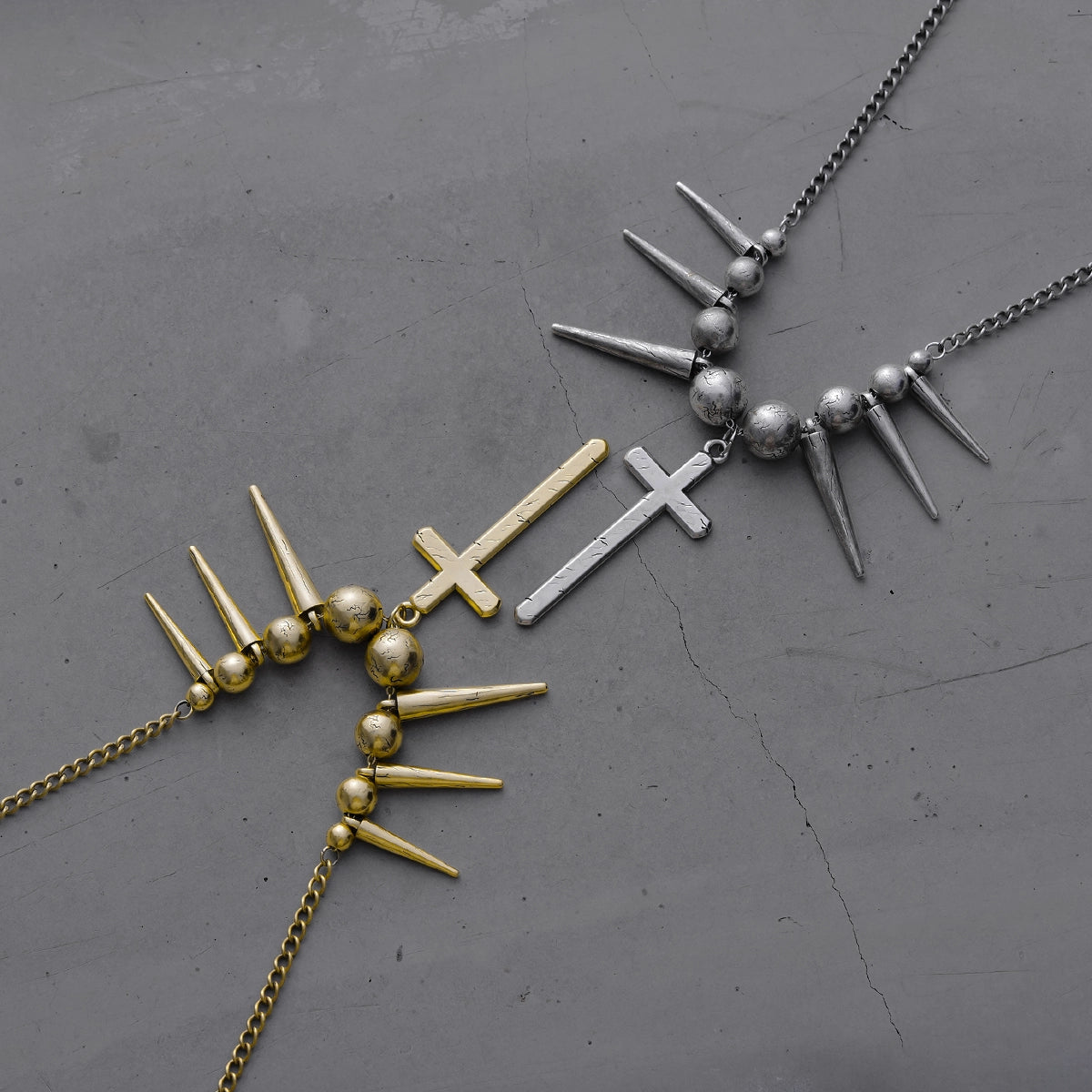 REBEL SPIKED CROSS NECKLACE