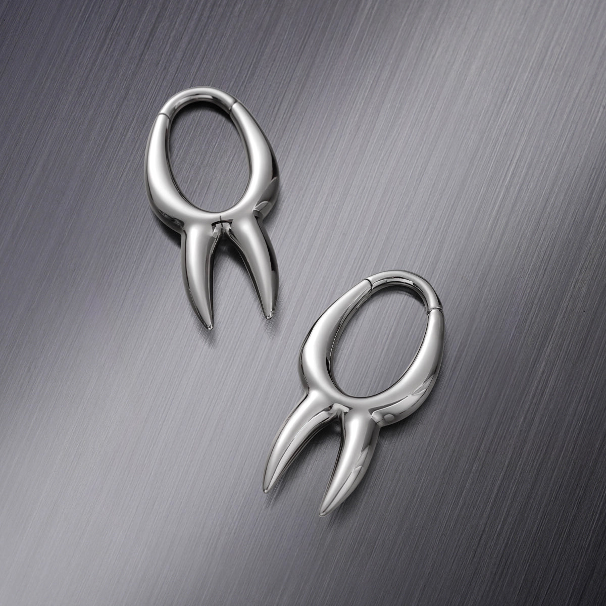 ABSTRACT FLOW EAR WEIGHTS
