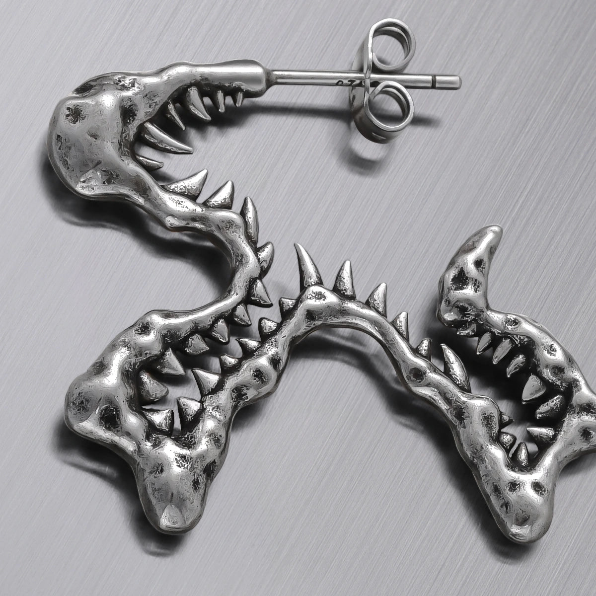 TWISTED FANG EARRINGS