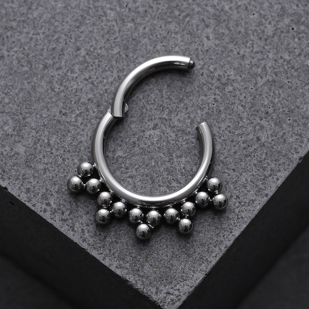SYMMETRIC SPHERE TITANIUM SEPTUM CLICKER