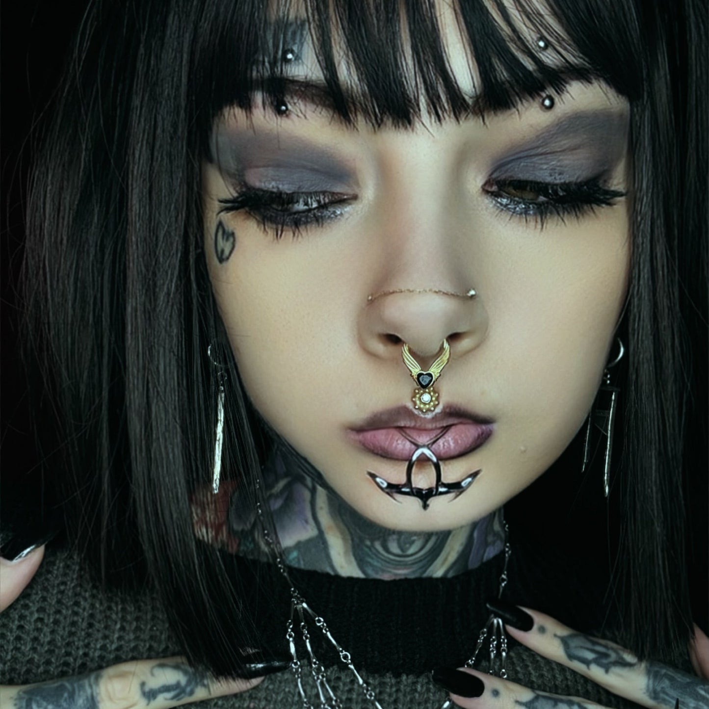 WINGED HEART SEPTUM CLICKER