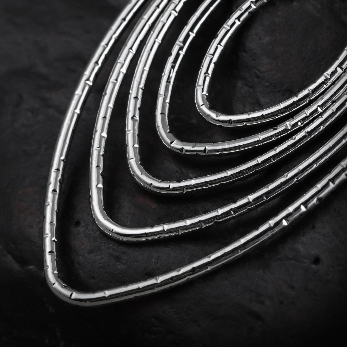 LAYERED ELLIPSE DANGLES