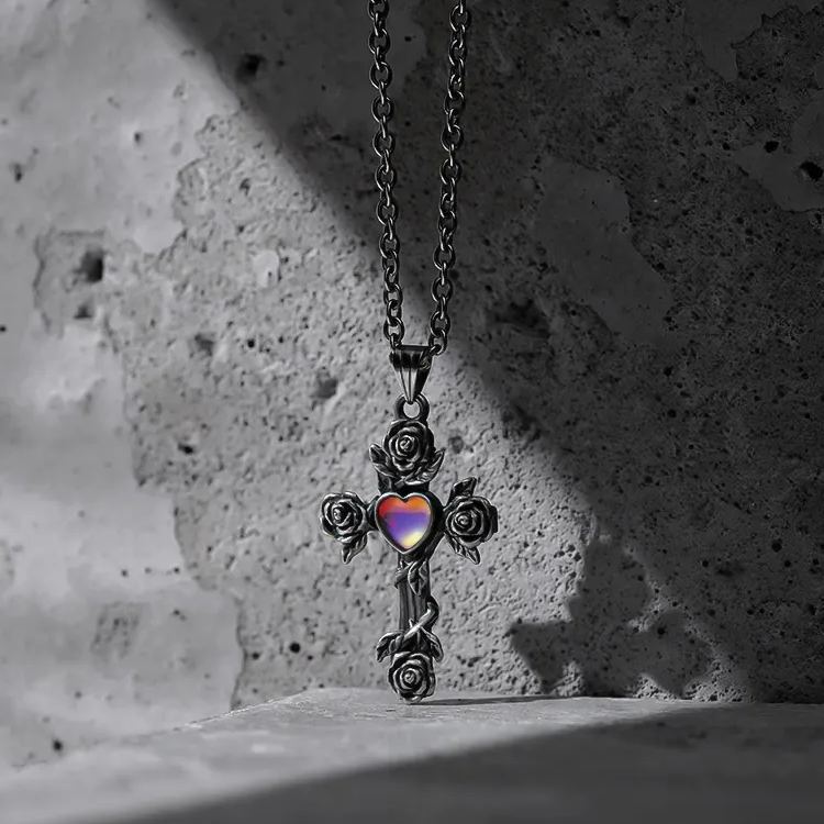 SACRIFICE AND BEAUTY CROSS NECKLACE