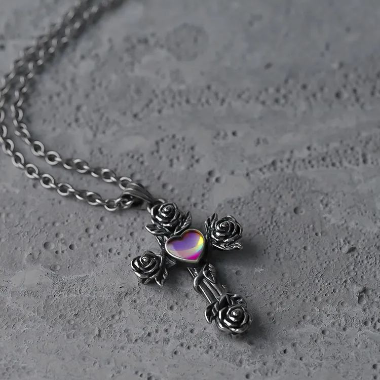 SACRIFICE AND BEAUTY CROSS NECKLACE