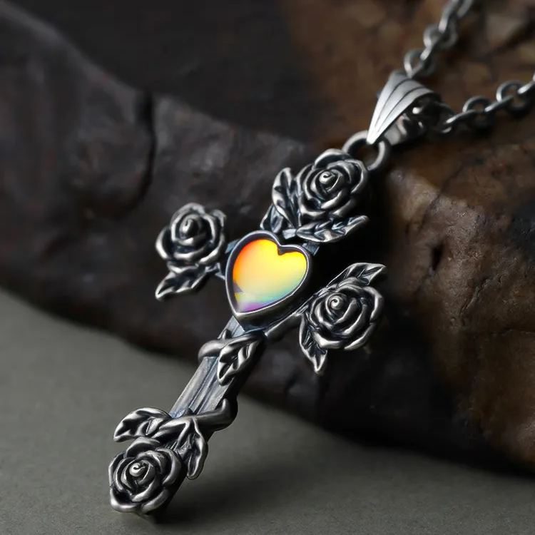 SACRIFICE AND BEAUTY CROSS NECKLACE