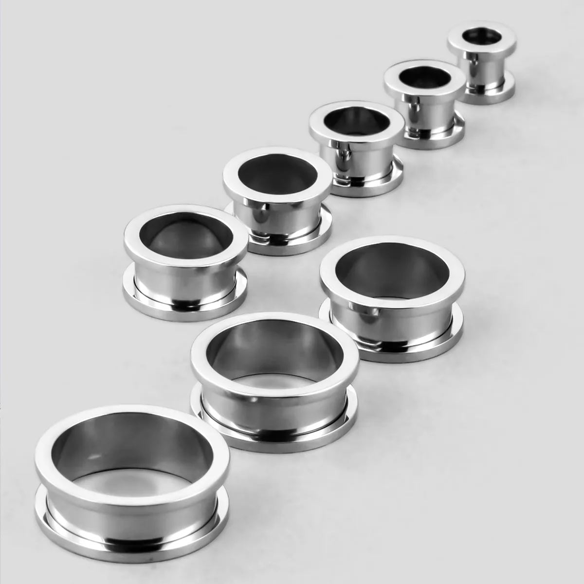 MINIMALIST CIRCLE TITANIUM TUNNELS