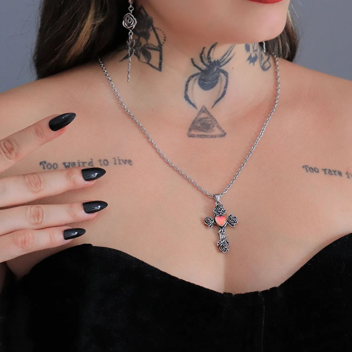 SACRIFICE AND BEAUTY CROSS NECKLACE