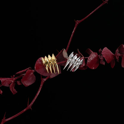 CARAPACE WING EAR STUDS