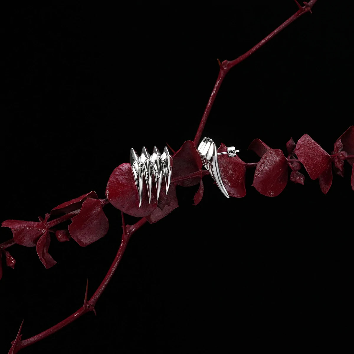 CARAPACE WING EAR STUDS