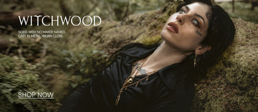 Woman lying on mossy ground with 'Witchwood' branding and call to action text.