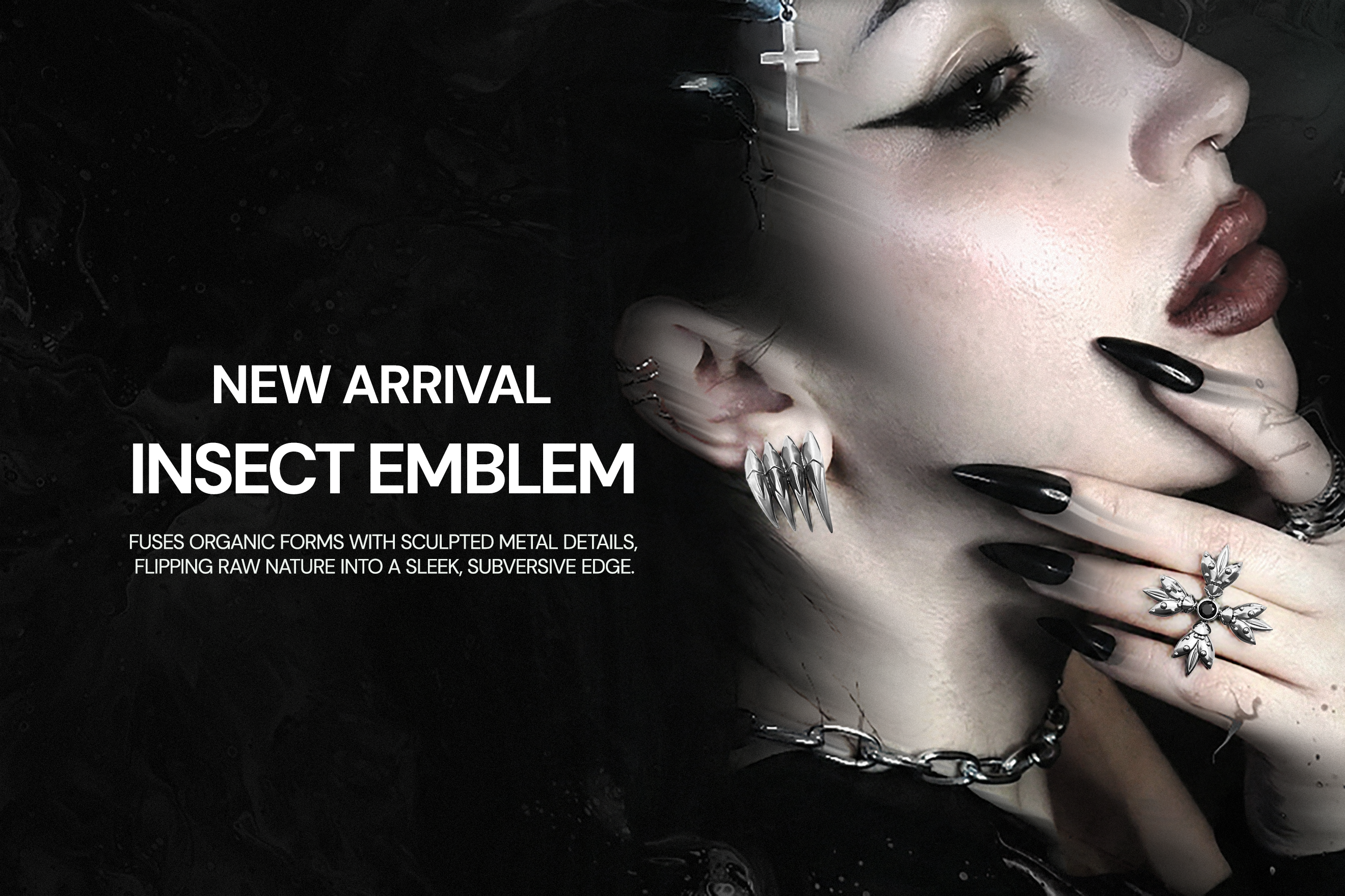 Person with black nail polish and insect emblem jewelry against a dark background