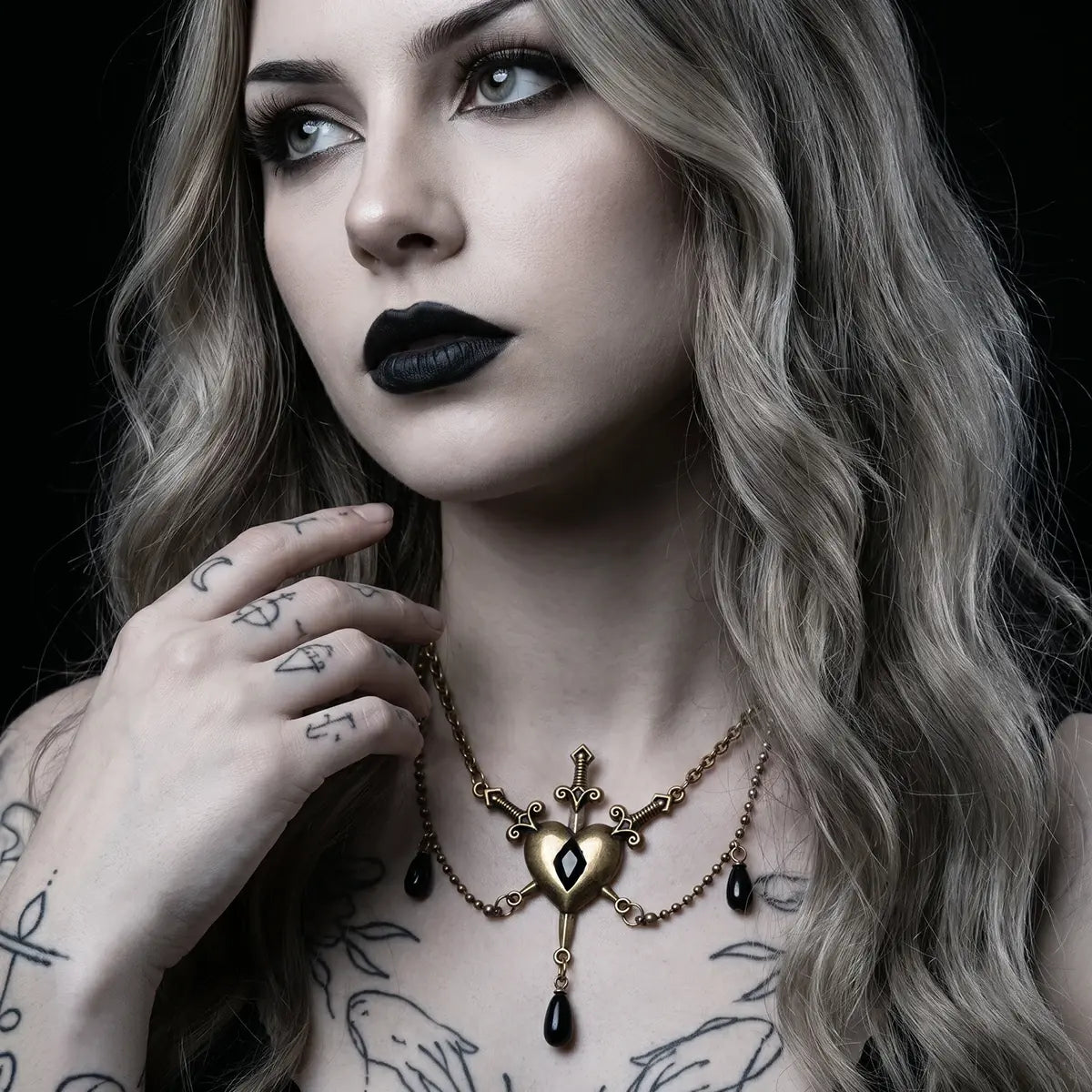 BLADEBOUND HEART NECKLACE