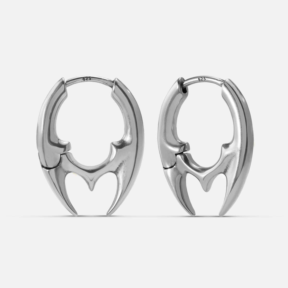 TWIN TALON EARRINGS