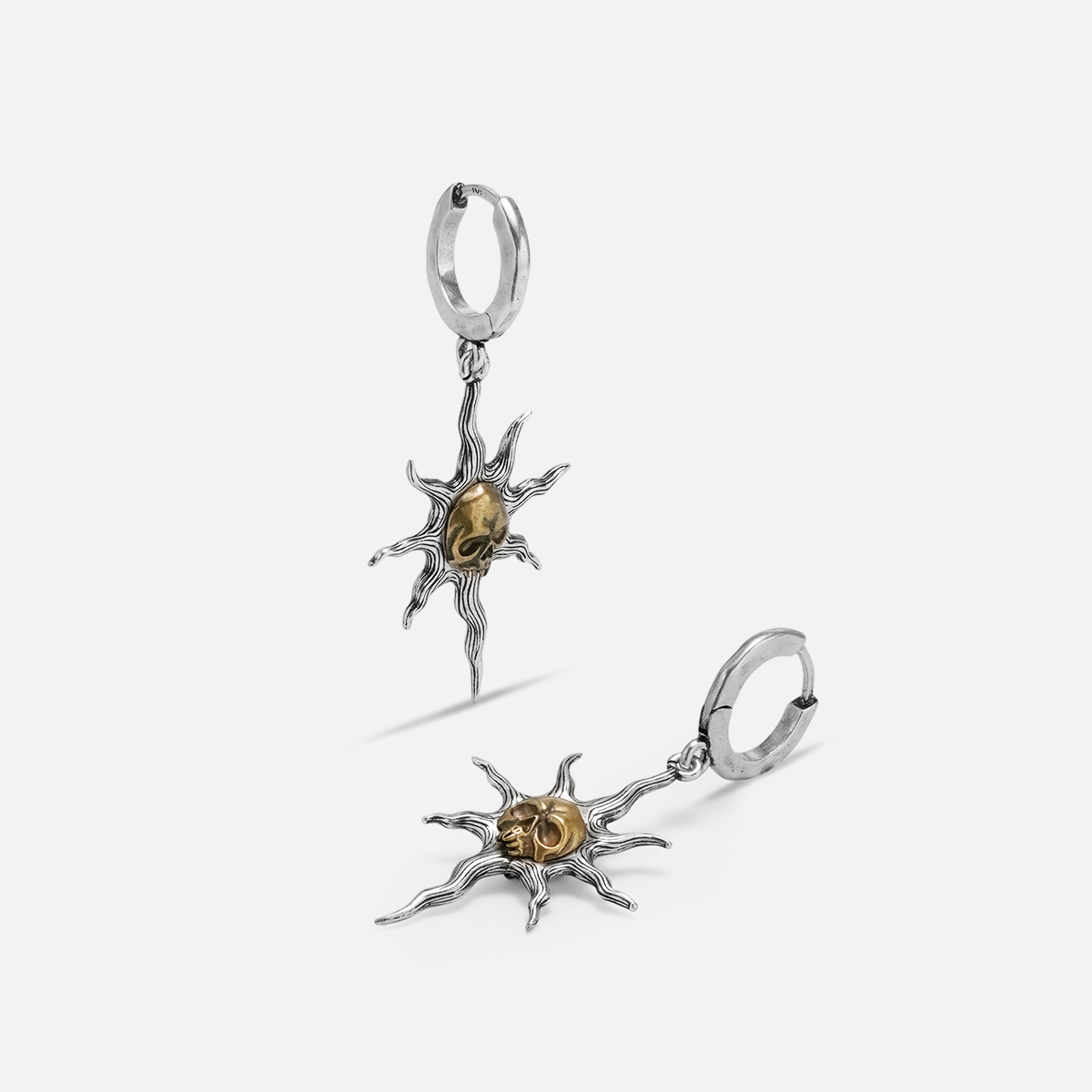 SOLAR FLAME SKULL EARRINGS