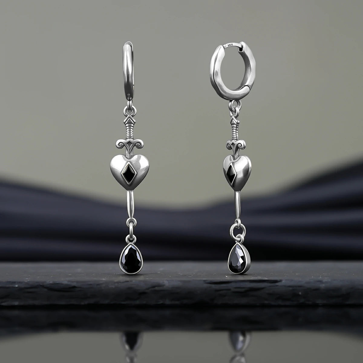HEARTPIERCER EARRINGS