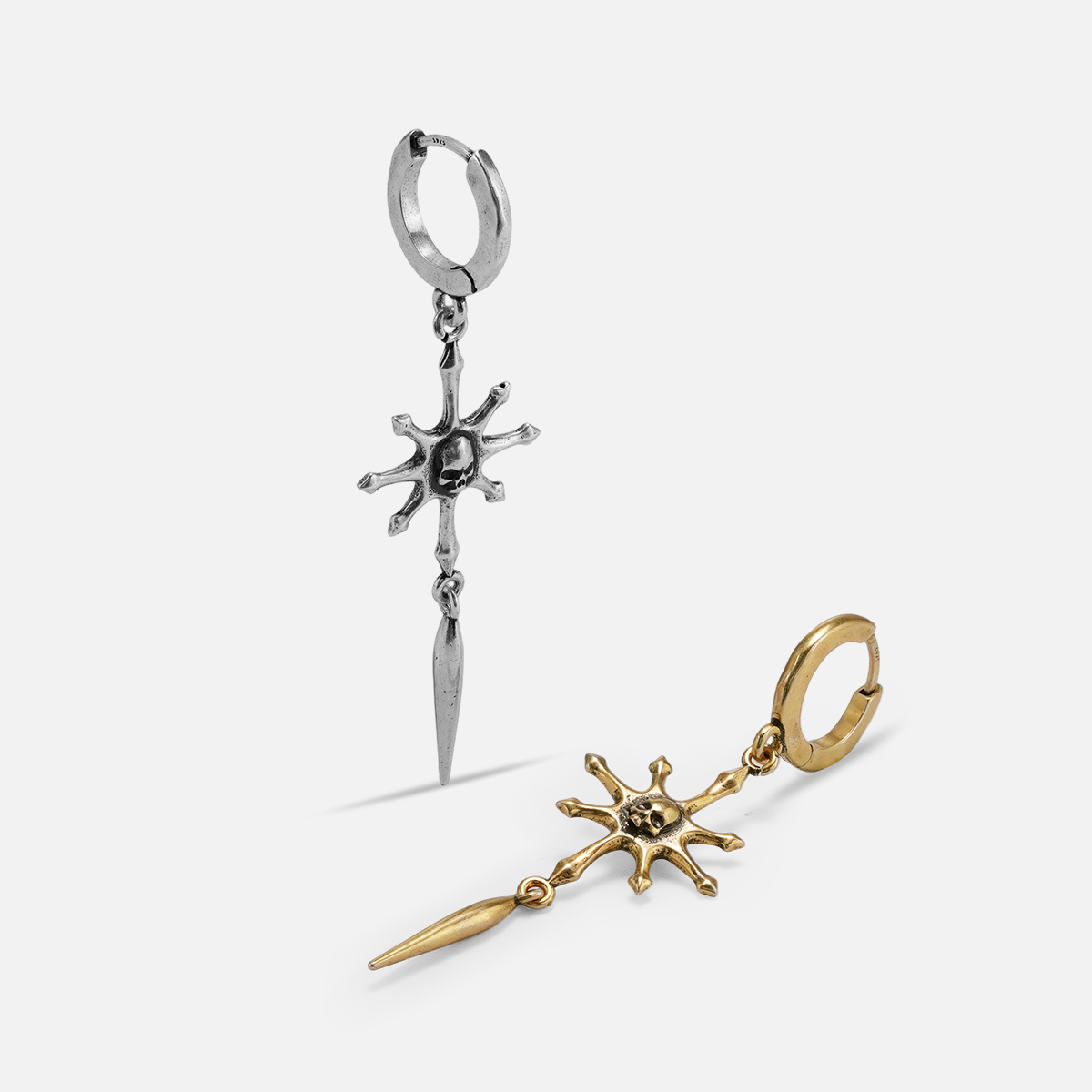 RADIANT SKULL SPEAR EARRINGS