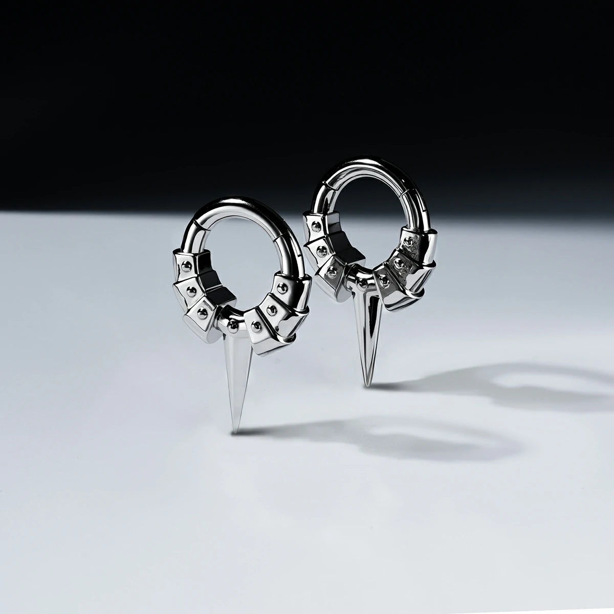 INTERLOCK SPIKE SEPTUM CLICKER