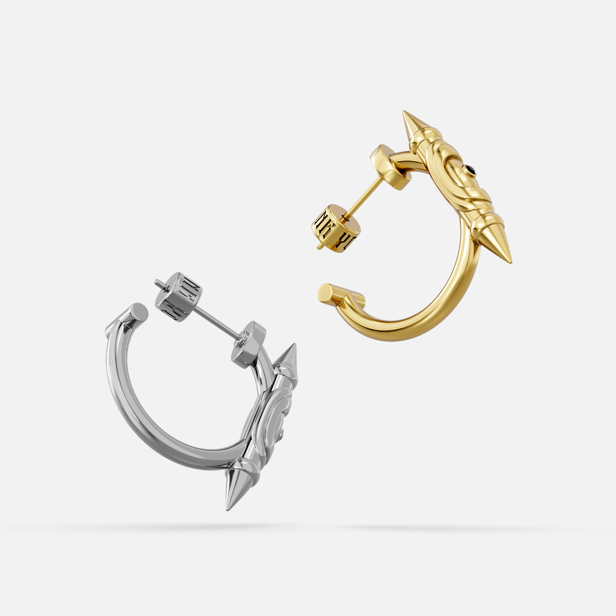 LAMINAR AXIS SPIKE EARRINGS