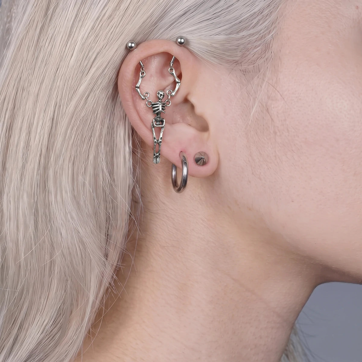 Bound Skeleton Dual-Point Ear Ornament