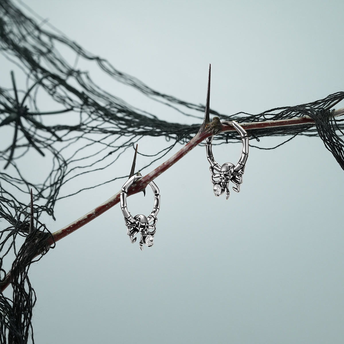 ARACHNID SKULL EARRINGS