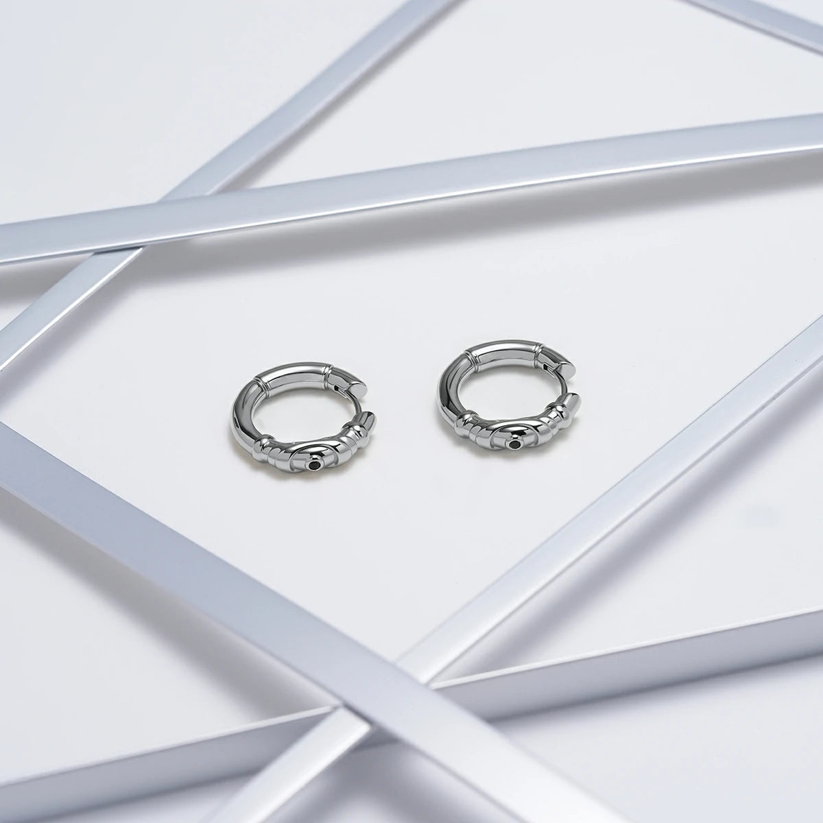 LAMINAR SEGMENT HOOP EARRINGS