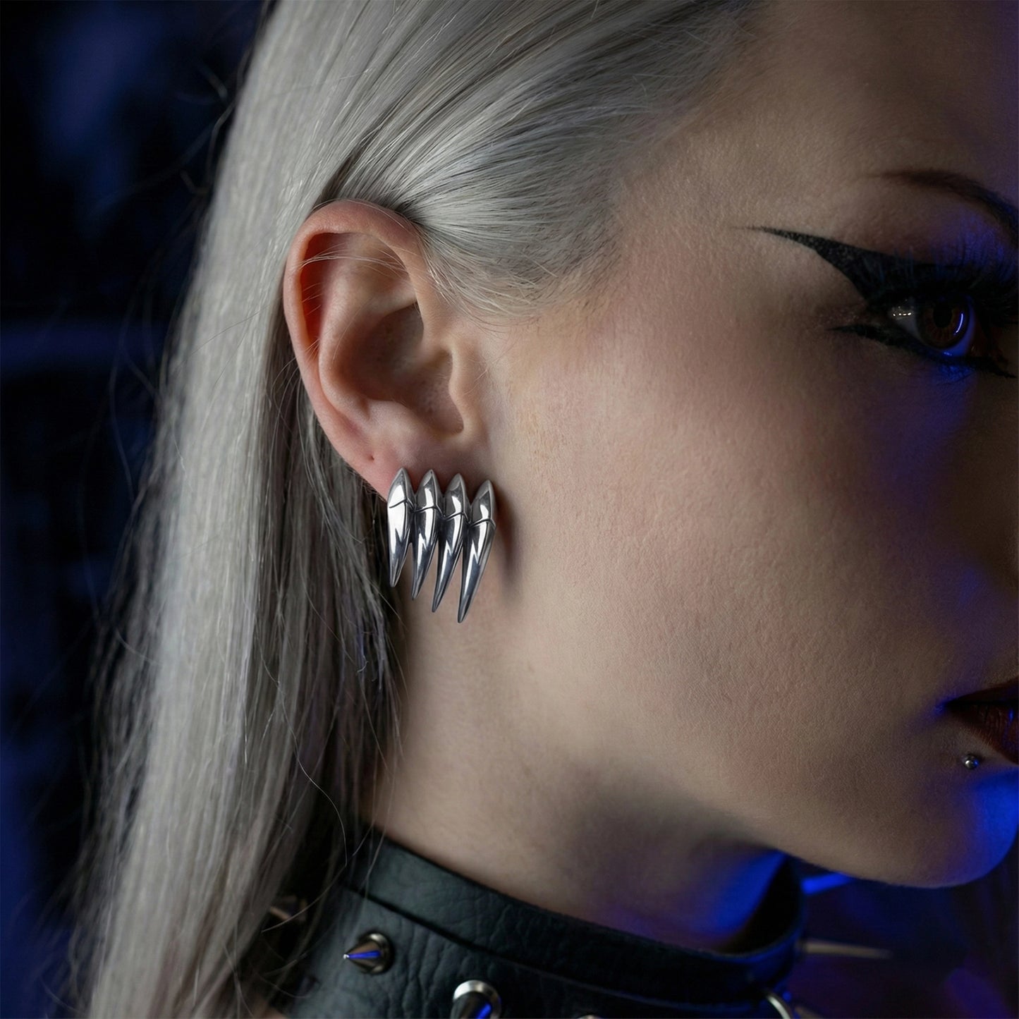 CARAPACE WING EAR STUDS