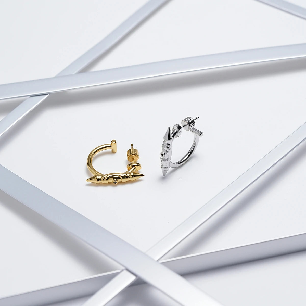 LAMINAR AXIS SPIKE EARRINGS