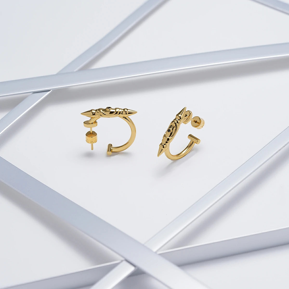 LAMINAR AXIS SPIKE EARRINGS