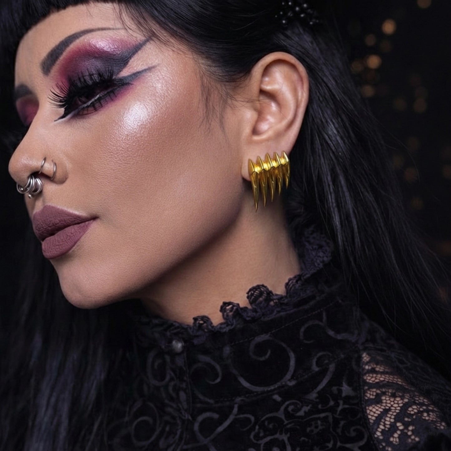 CARAPACE WING EAR STUDS