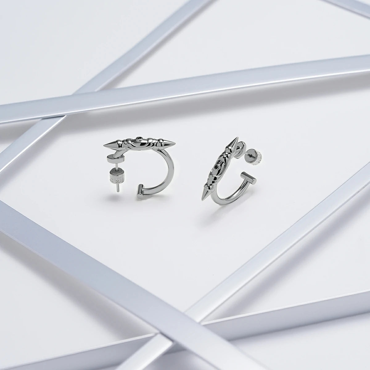 LAMINAR AXIS SPIKE EARRINGS