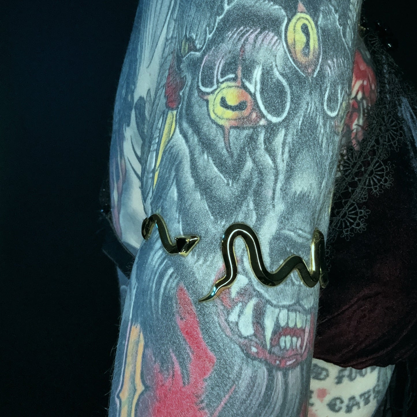 SERPENT LINE ARM CUFFS