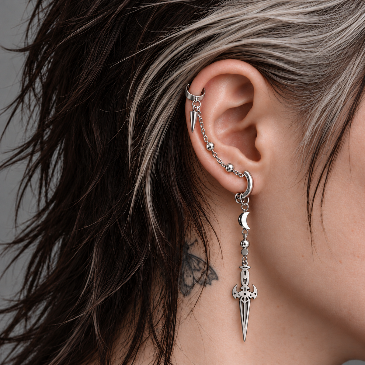 Moonblade Chain Earring worn on the ear