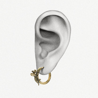 Gold Adaptive Evolution hoop earring shown on an ear illustration