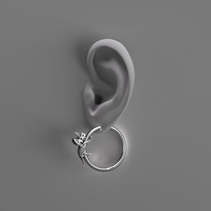 Silver Adaptive Evolution hoop earring shown on an ear illustration