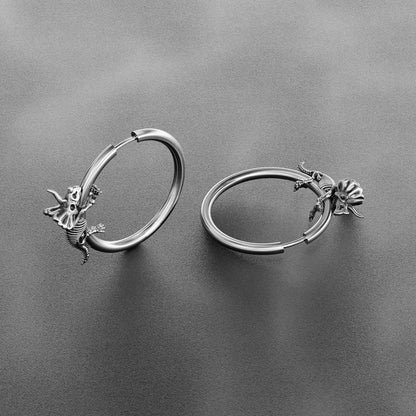Pair of silver Adaptive Evolution hoop earrings shown open and closed