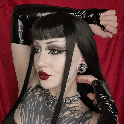 Model wearing black Alien Invasion tunnels with curled creature design
