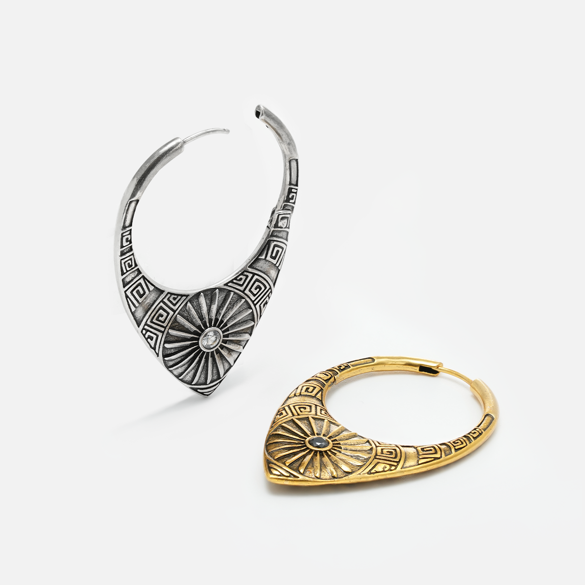 Two hoop earrings shown side by side, one in silver-tone finish and one in antique gold-tone finish