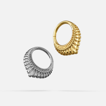 Silver- and gold-tone Artisan Inspired Clickers displayed together from angled views to show the curved profile.