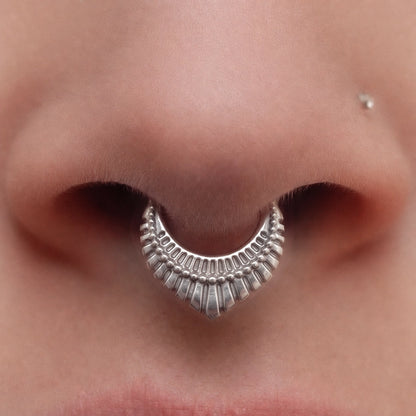 Silver-tone Artisan Inspired Clicker worn as a septum ring, featuring layered artisan-style detailing.