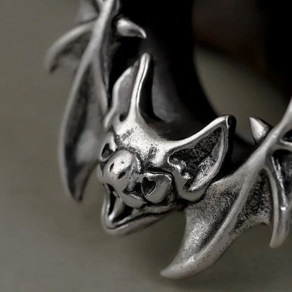 Close-up of silver Bat Whisper tunnel with sculpted bat face and wings