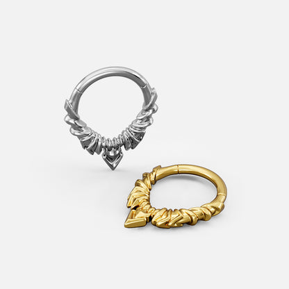 Silver- and gold-tone Bat Wing Clickers shown from multiple angles to display the ring profile and layered design.