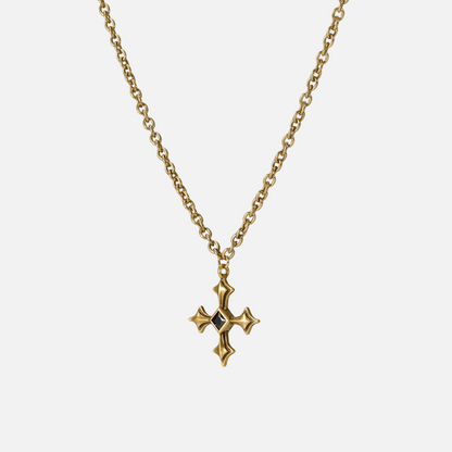 Black Testament Necklace in gold shown vertically on white, highlighting the gothic cross pendant and chain.