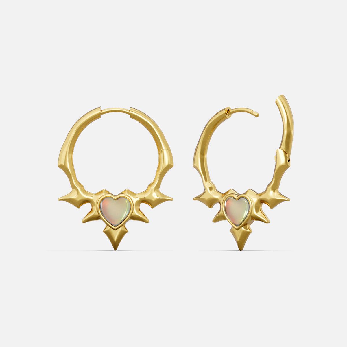 Gold-tone spiked hoop earrings with a heart-shaped opal center, front and side view