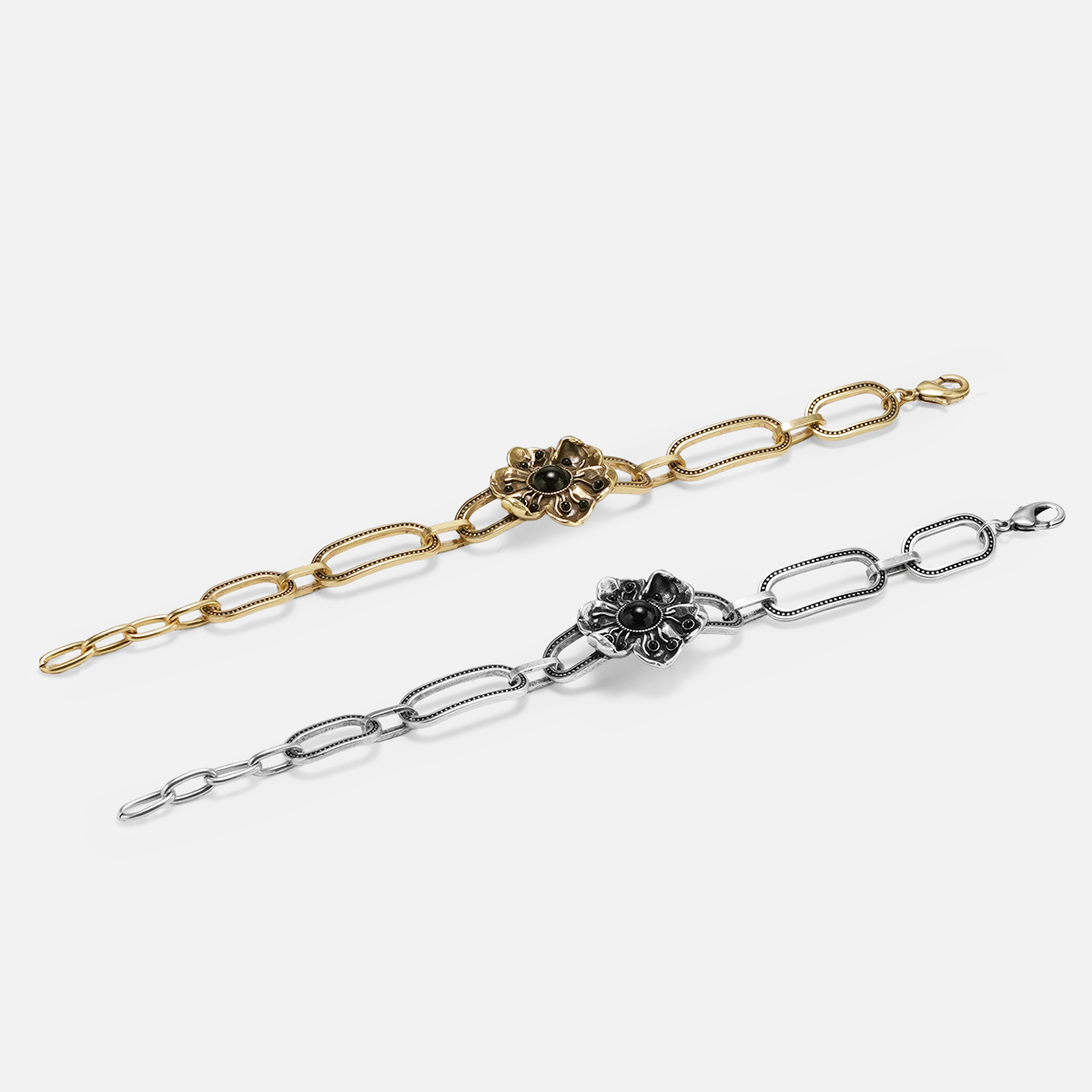 Silver and gold Bound Bloom bracelets with large chain links and floral centers