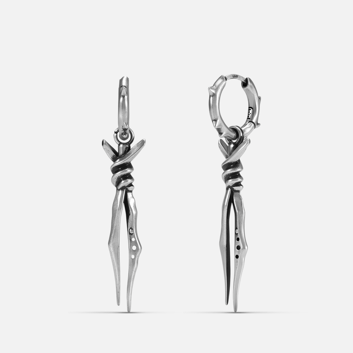 Bound Twin Earrings in silver-tone brass with bound twin spike pendants and hammered hoop design